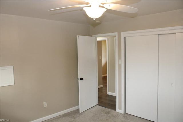 5857 Frament Ave, Norfolk, VA 23502 - unfurnished bedroom featuring light carpet, a closet, baseboards, and a ceiling fan