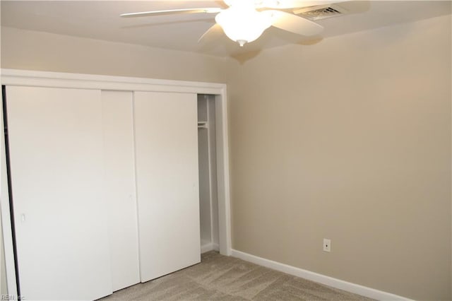 5857 Frament Ave, Norfolk, VA 23502 - unfurnished bedroom with light colored carpet, a closet, baseboards, and ceiling fan