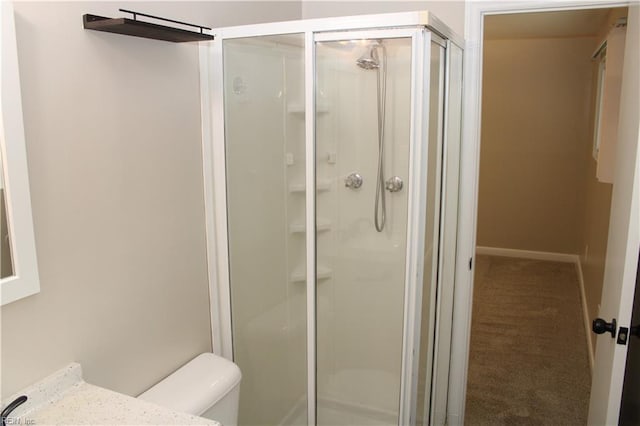 5857 Frament Ave, Norfolk, VA 23502 - full bathroom featuring toilet, a stall shower, vanity, and baseboards