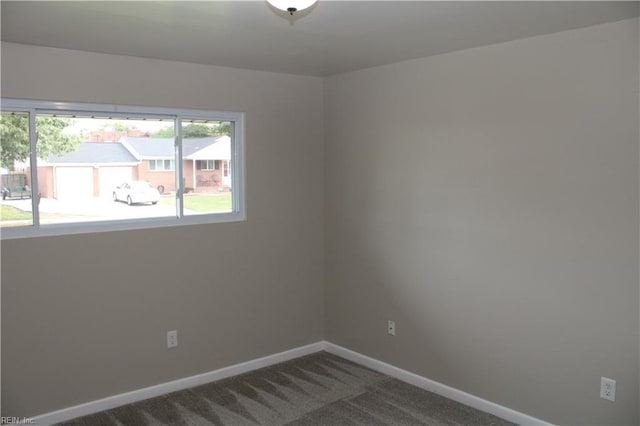 5857 Frament Ave, Norfolk, VA 23502 - empty room featuring baseboards and dark carpet