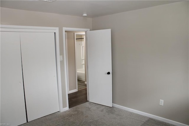 5857 Frament Ave, Norfolk, VA 23502 - unfurnished bedroom with carpet flooring, a closet, and baseboards