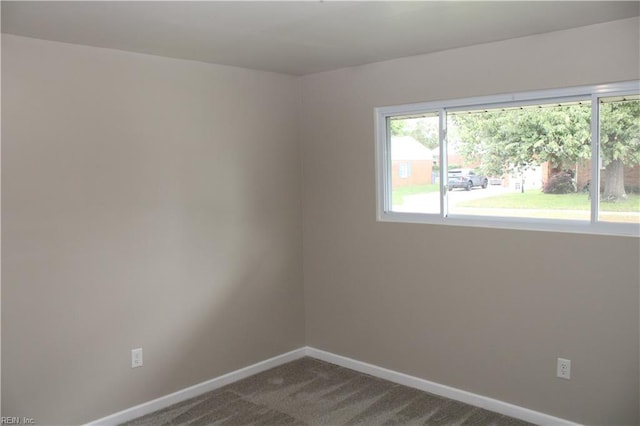 5857 Frament Ave, Norfolk, VA 23502 - empty room featuring baseboards and dark carpet