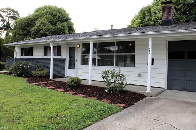 5857 Frament Ave, Norfolk, VA 23502 - ranch-style home featuring a front lawn, roof with shingles, a chimney, and concrete driveway