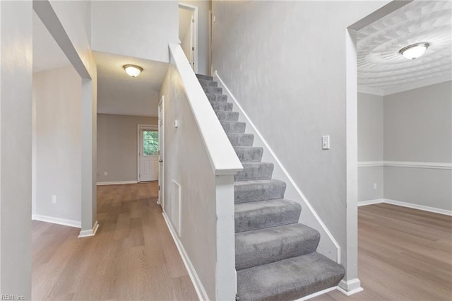 6218 Whaley Ct, Norfolk, VA 23502 - stairs featuring wood finished floors and baseboards