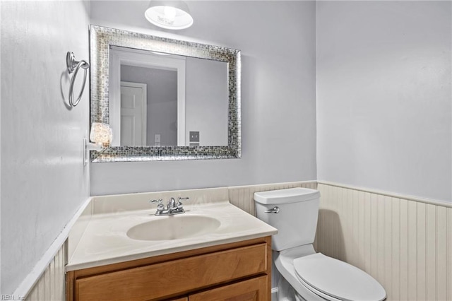 1321 Laurelfield Ct, Virginia Beach, VA 23454 - half bath with toilet, vanity, and a wainscoted wall