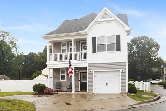 5516 Sadie Ln, Virginia Beach, VA 23462 - view of front facade with a balcony, roof with shingles, concrete driveway, an attached garage, and covered porch