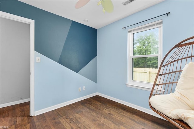 112 Hopemont Ln, Suffolk, VA 23434 - unfurnished room with baseboards, wood finished floors, and ceiling fan