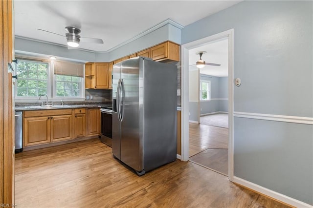 2 Sheralyn Pl, Hampton, VA 23666 - kitchen featuring stainless steel appliances, ceiling fan, a sink, and light wood-style flooring
