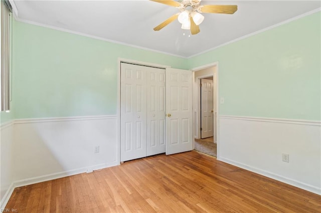 2 Sheralyn Pl, Hampton, VA 23666 - unfurnished bedroom featuring light wood-style flooring, a closet, crown molding, baseboards, and ceiling fan