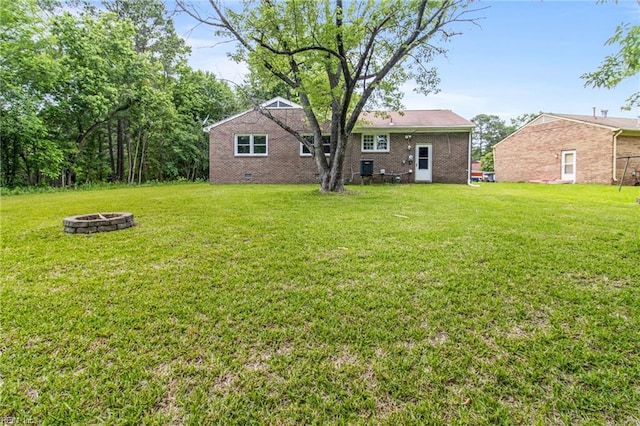 2 Sheralyn Pl, Hampton, VA 23666 - view of green lawn with an outdoor fire pit