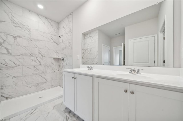 3032 Dalton Cir, Suffolk, VA 23435 - bathroom with double vanity, marble finish flooring, and tiled shower