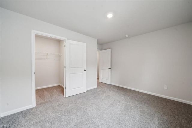 3032 Dalton Cir, Suffolk, VA 23435 - unfurnished bedroom with carpet, a spacious closet, and baseboards