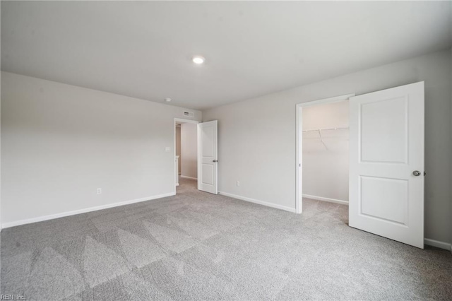3032 Dalton Cir, Suffolk, VA 23435 - unfurnished bedroom with carpet, baseboards, a spacious closet, a closet, and recessed lighting