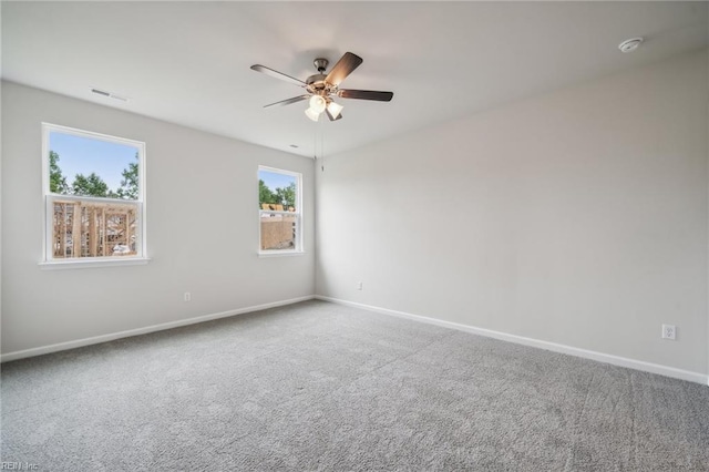 3032 Dalton Cir, Suffolk, VA 23435 - carpeted empty room with a ceiling fan, baseboards, and a smoke detector
