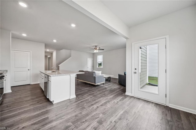 3032 Dalton Cir, Suffolk, VA 23435 - kitchen featuring ceiling fan, open floor plan, dark wood finished floors, white cabinetry, and baseboards