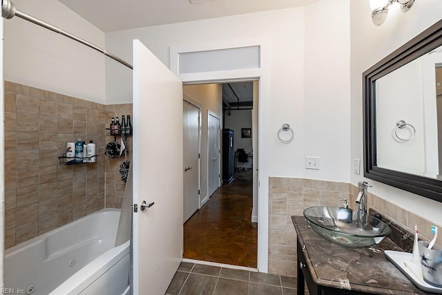 415 Saint Pauls Blvd Unit 309, Norfolk, VA 23510 - full bath featuring double vanity, a combined bath / shower with jetted tub, and tile patterned flooring