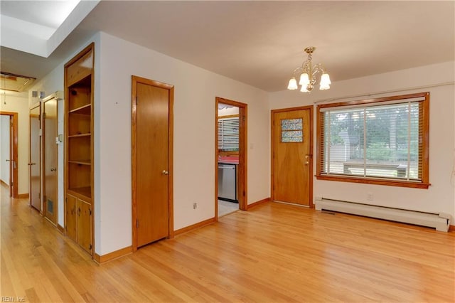 449 Martha Lee Dr, Hampton, VA 23666 - entrance foyer with baseboard heating, light wood-style floors, a chandelier, and baseboards