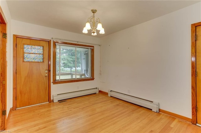 449 Martha Lee Dr, Hampton, VA 23666 - unfurnished room featuring a baseboard heating unit, a chandelier, light wood finished floors, and baseboards