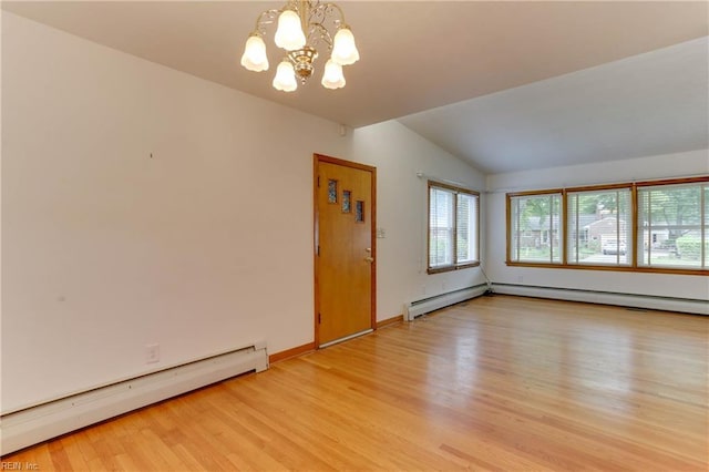 449 Martha Lee Dr, Hampton, VA 23666 - spare room with baseboard heating, vaulted ceiling, light wood finished floors, a chandelier, and baseboards