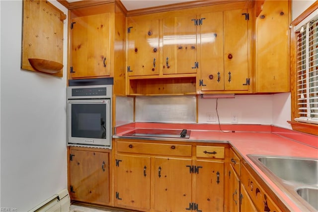 449 Martha Lee Dr, Hampton, VA 23666 - kitchen with oven, a baseboard radiator, black electric cooktop, and brown cabinetry