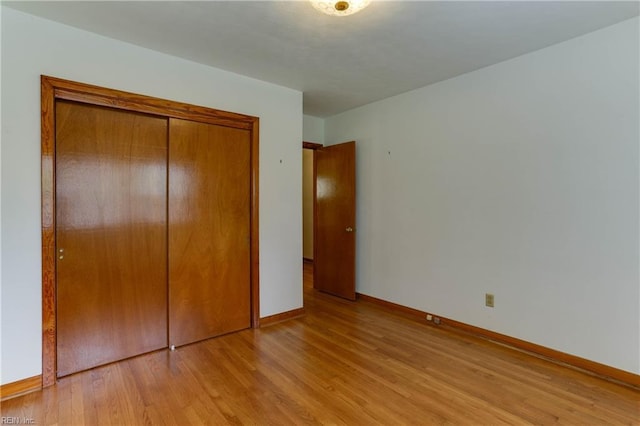 449 Martha Lee Dr, Hampton, VA 23666 - unfurnished bedroom with light wood-type flooring, baseboards, and a closet
