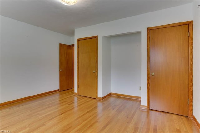 449 Martha Lee Dr, Hampton, VA 23666 - unfurnished bedroom featuring light wood-type flooring and baseboards