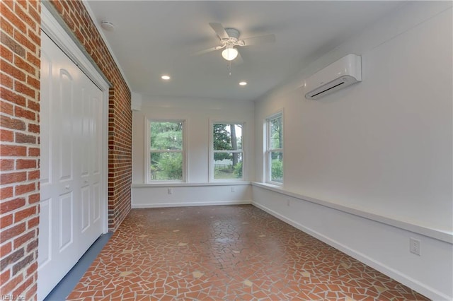 449 Martha Lee Dr, Hampton, VA 23666 - unfurnished sunroom with an AC wall unit, baseboards, recessed lighting, brick wall, and stone finish flooring
