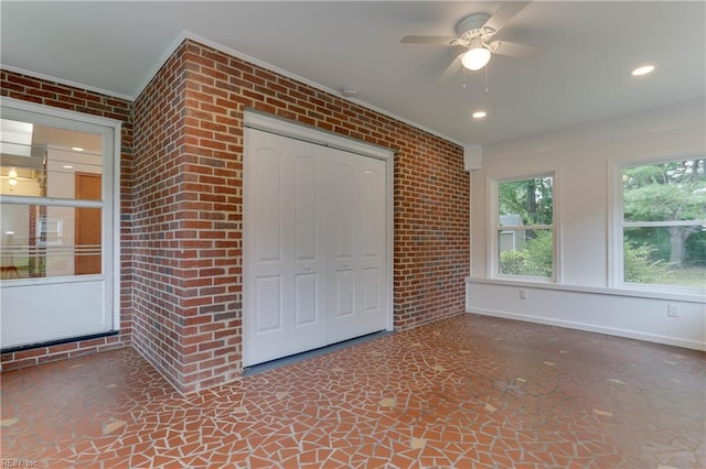 449 Martha Lee Dr, Hampton, VA 23666 - unfurnished bedroom with a closet, brick wall, ceiling fan, baseboards, and recessed lighting