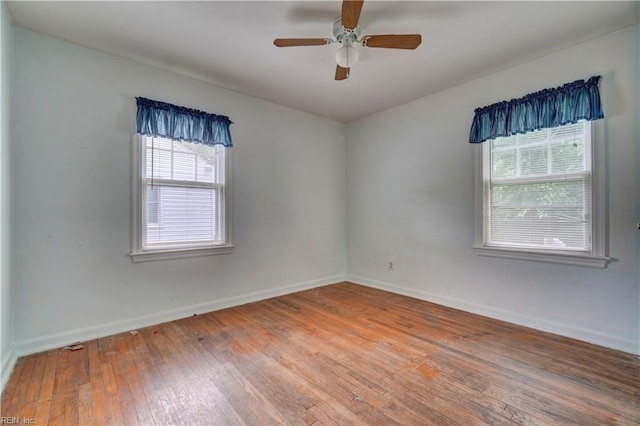 10 Dotson Dr, Hampton, VA 23669 - spare room featuring hardwood / wood-style floors, baseboards, and a ceiling fan