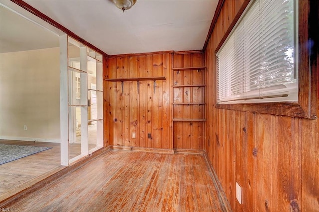 10 Dotson Dr, Hampton, VA 23669 - empty room with wooden walls and wood finished floors