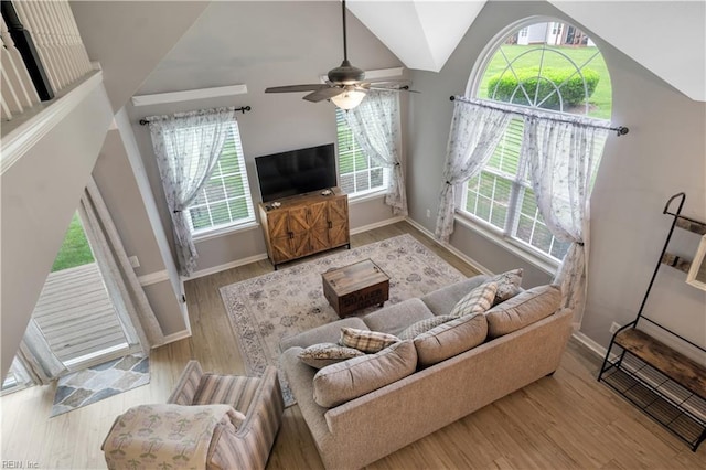 189 Shoal Crk, Williamsburg, VA 23185 - living area featuring wood finished floors, baseboards, vaulted ceiling, and a ceiling fan