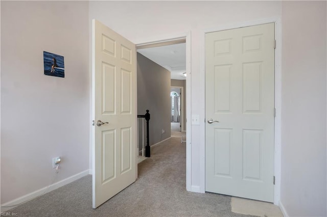 189 Shoal Crk, Williamsburg, VA 23185 - hallway featuring light colored carpet and baseboards