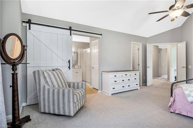189 Shoal Crk, Williamsburg, VA 23185 - bedroom with light carpet, vaulted ceiling, baseboards, a barn door, and a ceiling fan