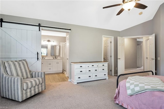 189 Shoal Crk, Williamsburg, VA 23185 - bedroom with light colored carpet, vaulted ceiling, ensuite bathroom, ceiling fan, and baseboards