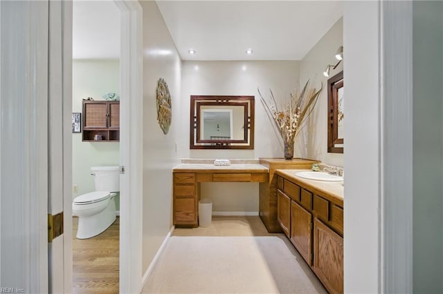 1 Hatteras Lndg, Hampton, VA 23669 - bathroom with toilet, vanity, wood finished floors, and baseboards