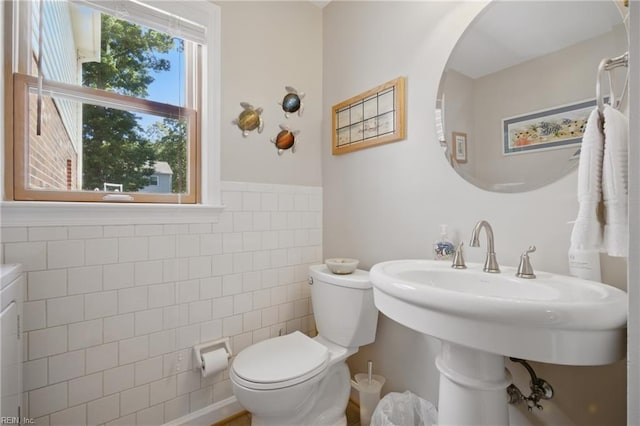 1 Hatteras Lndg, Hampton, VA 23669 - half bath featuring tile walls, toilet, and wainscoting