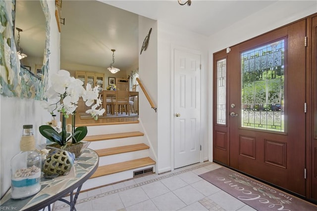 1 Hatteras Lndg, Hampton, VA 23669 - entryway with baseboards, tile patterned floors, and stairway