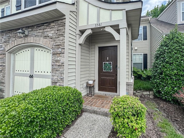 5541 Frog Pond Ln, Virginia Beach, VA 23455 - view of exterior entry featuring stone siding