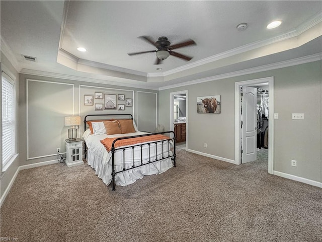 5541 Frog Pond Ln, Virginia Beach, VA 23455 - bedroom with crown molding, a tray ceiling, a walk in closet, baseboards, and carpet
