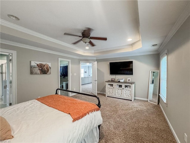 5541 Frog Pond Ln, Virginia Beach, VA 23455 - carpeted bedroom featuring a tray ceiling, a spacious closet, ornamental molding, baseboards, and ceiling fan