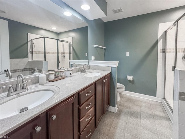 5541 Frog Pond Ln, Virginia Beach, VA 23455 - bathroom with a shower stall, toilet, double vanity, and baseboards