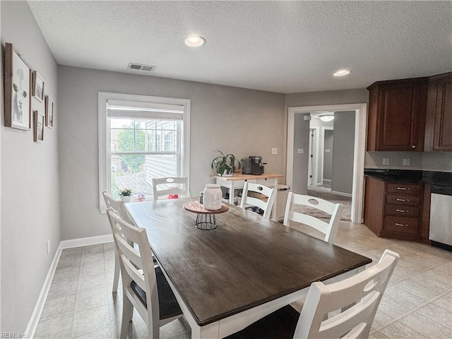 5541 Frog Pond Ln, Virginia Beach, VA 23455 - dining space with a textured ceiling, light tile patterned floors, baseboards, and recessed lighting