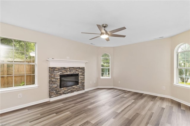 5352 Bardith Cir, Virginia Beach, VA 23455 - unfurnished living room featuring wood finished floors, a ceiling fan, a fireplace, and baseboards