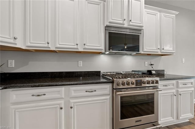 1120 Veranda Way, Chesapeake, VA 23320 - kitchen featuring stainless steel appliances, white cabinets, and dark stone countertops