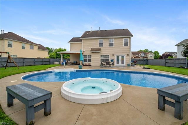 1120 Veranda Way, Chesapeake, VA 23320 - view of swimming pool with a patio area, french doors, and a pool with connected hot tub