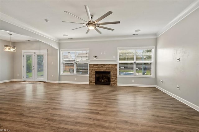 1120 Veranda Way, Chesapeake, VA 23320 - unfurnished living room featuring crown molding, dark wood-style flooring, baseboards, ceiling fan, and a fireplace