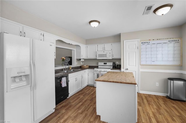 4632 Marlwood Way, Virginia Beach, VA 23462 - kitchen with white appliances, wood finished floors, a kitchen island, and white cabinets