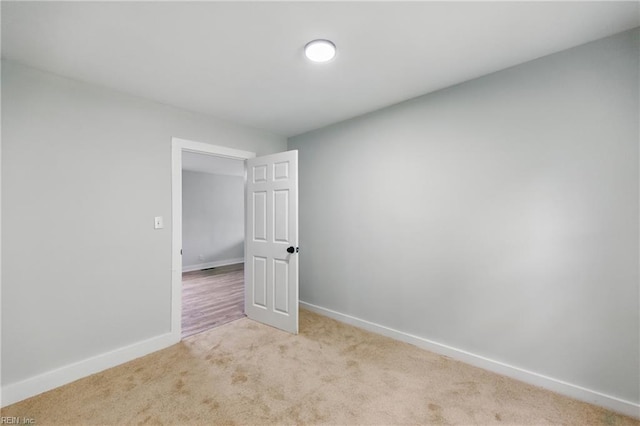 111 S Lloyd St, Suffolk, VA 23434 - empty room featuring light carpet and baseboards