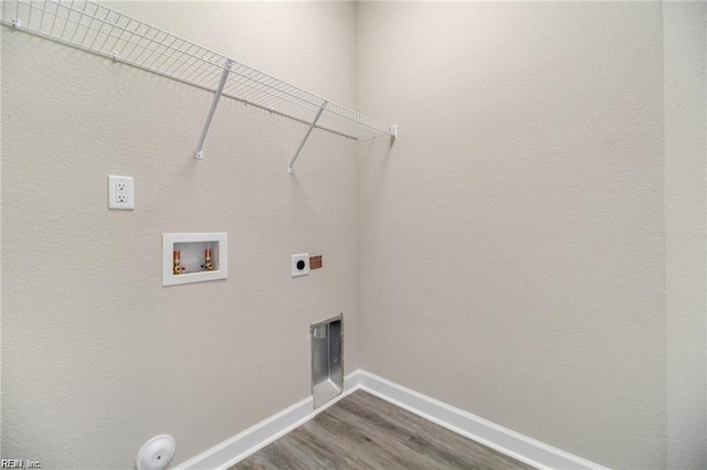 208 Beech St, Suffolk, VA 23434 - laundry room featuring hookup for an electric dryer, washer hookup, dark wood-type flooring, and baseboards