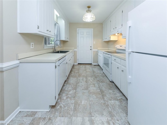 973 Banks Ln, Newport News, VA 23608 - kitchen with white appliances, a sink, baseboards, light countertops, and white cabinetry